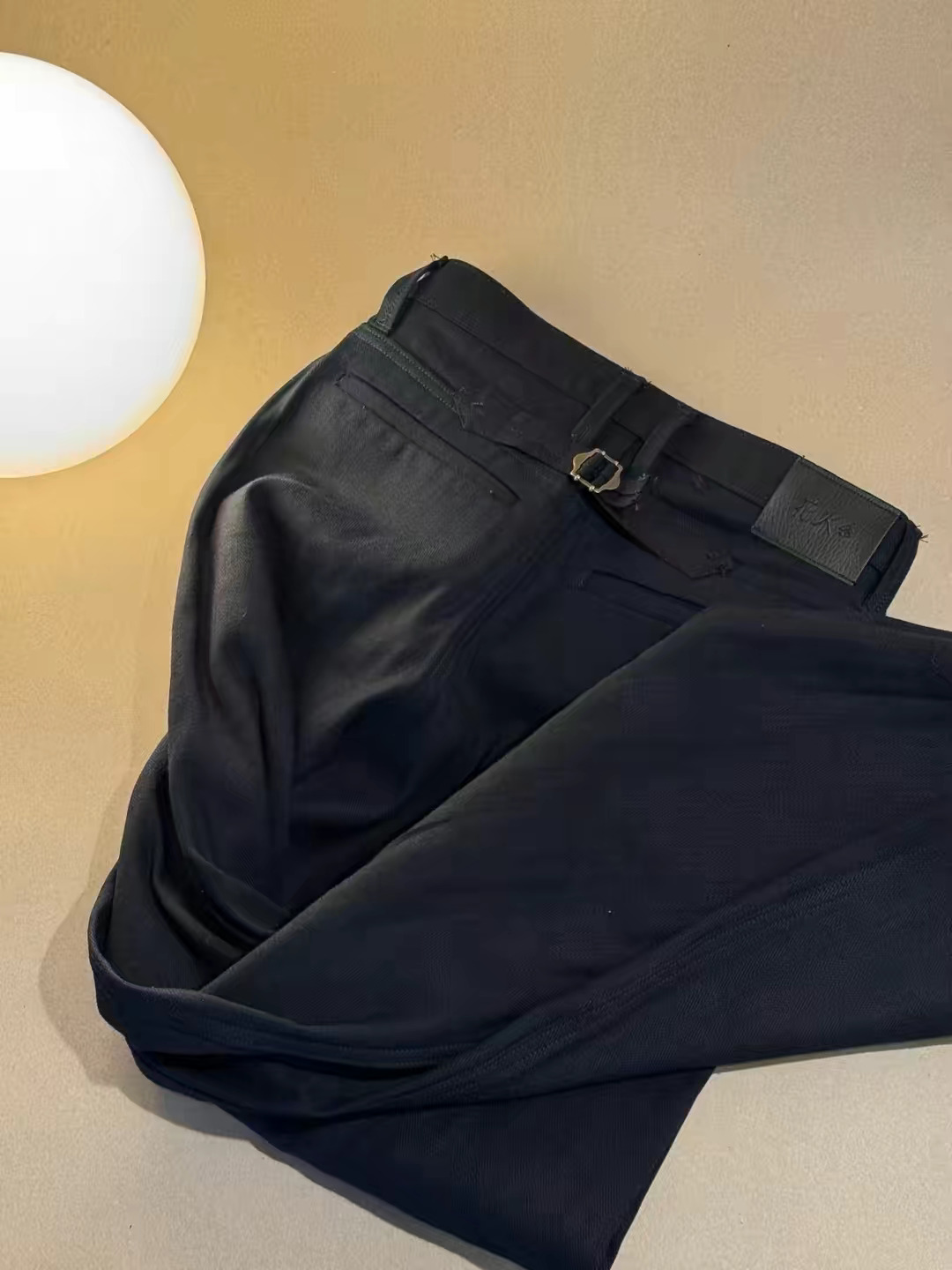 Pleated Wool Trousers